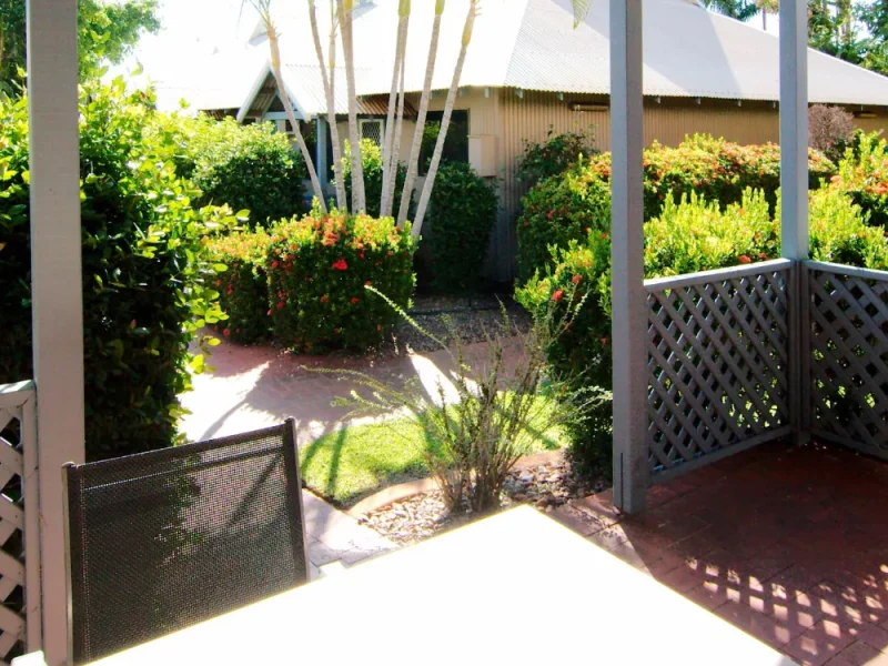 Cable Beach Apartments 2 Bedroom Patio View with lush gardens